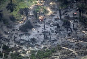 A view of an illegal crude oil refinery site in the creeks of an Ogoni community in Nigeria's Niger Delta